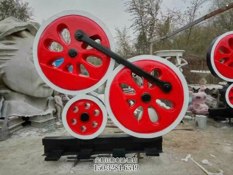 金属车轮雕塑承接，陆地摆件，广场车轮雕塑制造商